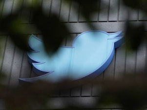 caption: Twitter's blue bird is seen on its headquarters building in San Francisco on July 24. Special counsel Jack Smith obtained search warrant for Twitter to turn over info on Trump's account, according to newly unsealed court documents.