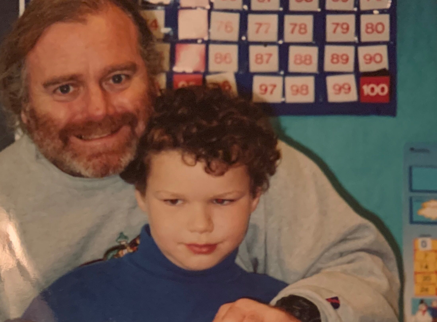 caption: Martin McGowan, left, a former teacher at West Woodland Elementary School in northwest Seattle, pictured here with first-grader Roman Harto in 2003.
