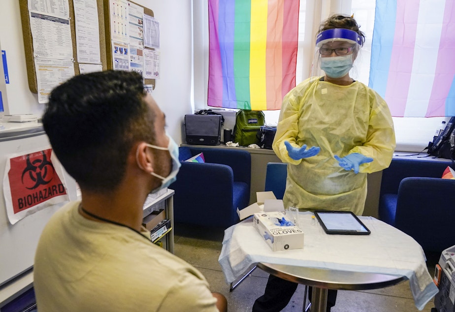 caption: Physician Assistant Susan Eng-Na, right, administers a monkeypox vaccine during a vaccination clinic in New York. New cases are starting to decline in New York and some other U.S. cities.
