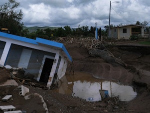 caption: The coastal communities of Salinas near the Rio Nigua experienced massive flooding during Hurricane Fiona.