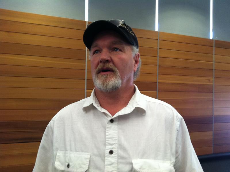 caption: Grocery owner Kevin Ashe of Darrington