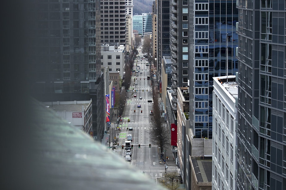 caption: A view of a quiet Second Avenue is shown on Thursday, March 26, 2020, in Seattle.
