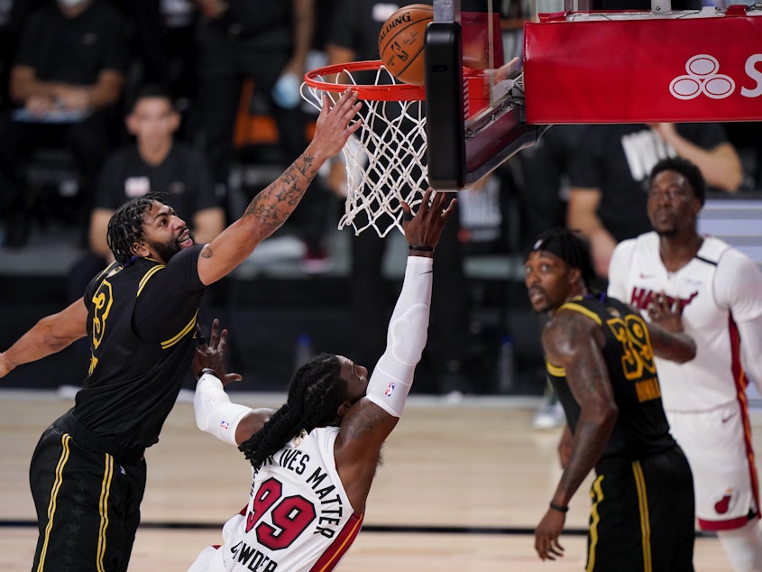 caption: The Los Angeles Lakers and the Miami Heat faced off in the NBA Finals last month. While some details remain, the new season will start on Dec. 22.