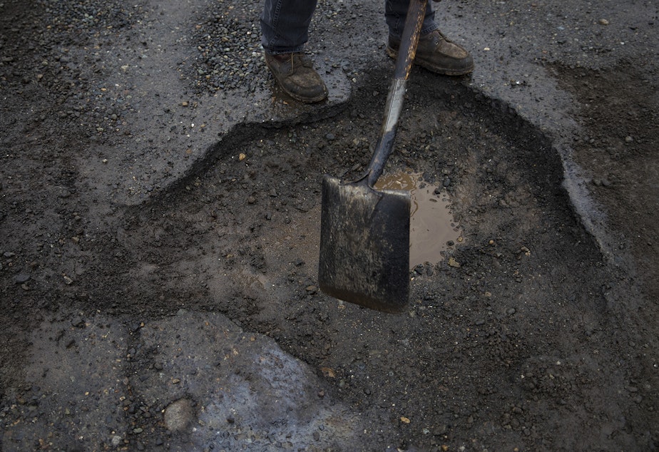 caption: A pothole in south Seattle.