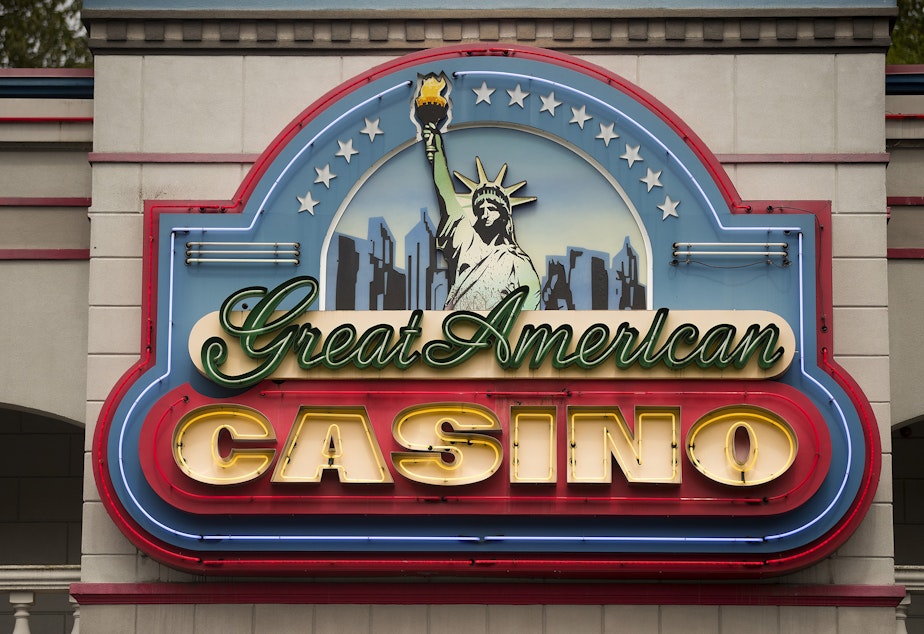 caption: The Great American Casino in Tukwila, Washington. This establishment is not run by a tribe. It's one of many "card rooms" in the state that are restricted by law against offering certain types of gambling. Tribal casinos, by contrast, can offer a wider variety of games, including sports betting. 