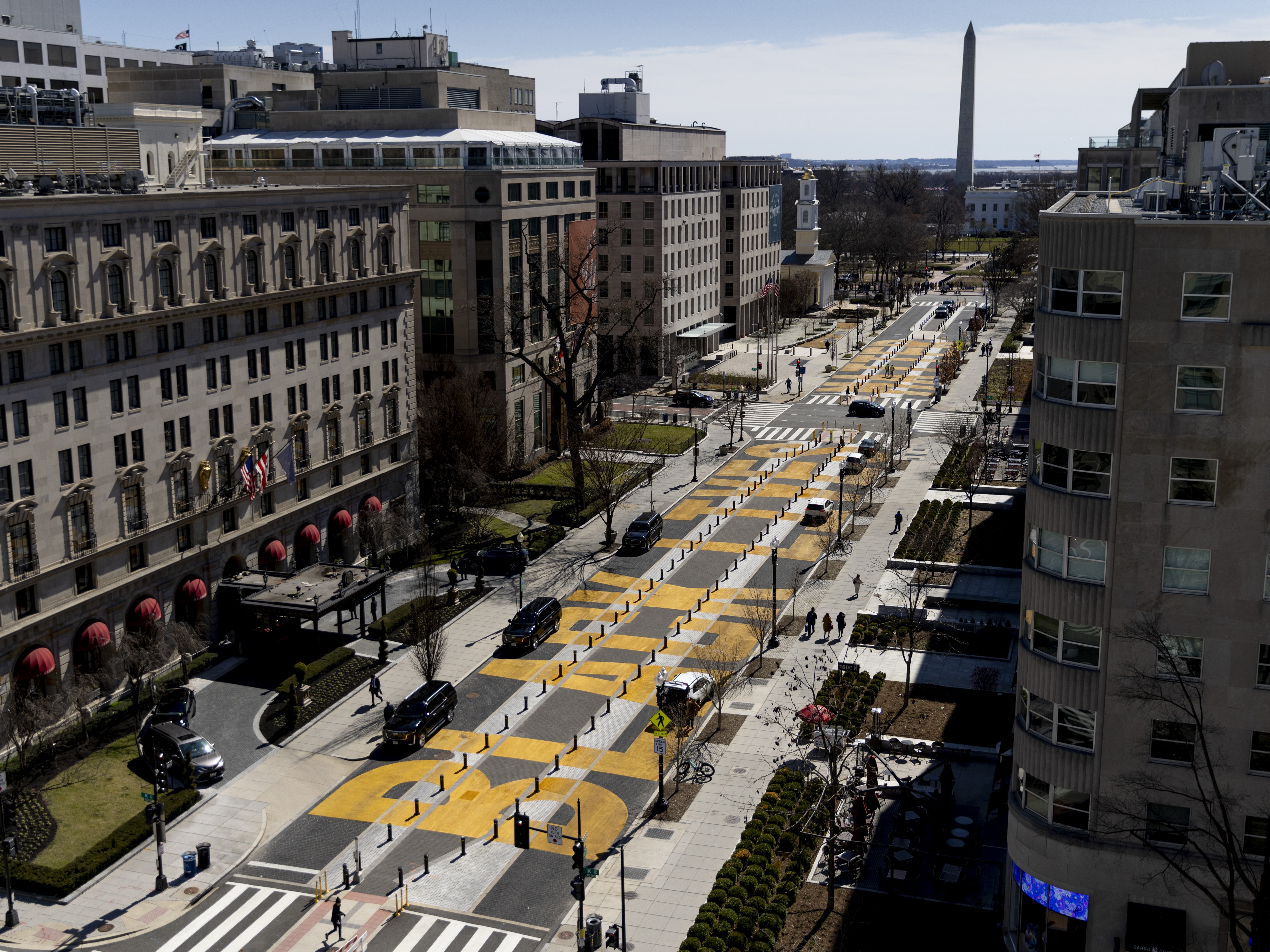 caption: Reconstruction on Black Lives Matter Plaza in Washington, D.C., began Monday.