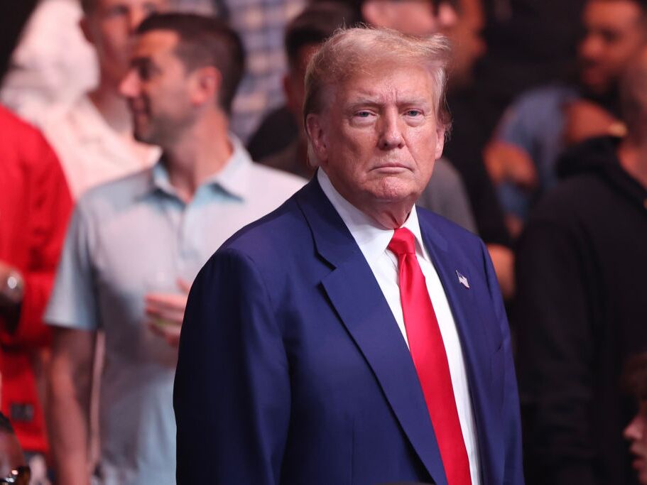 caption: The Supreme Court ruled against a liberal activist who tried to trademark the phrase "Trump too small," which he put on T-shirts and sold.