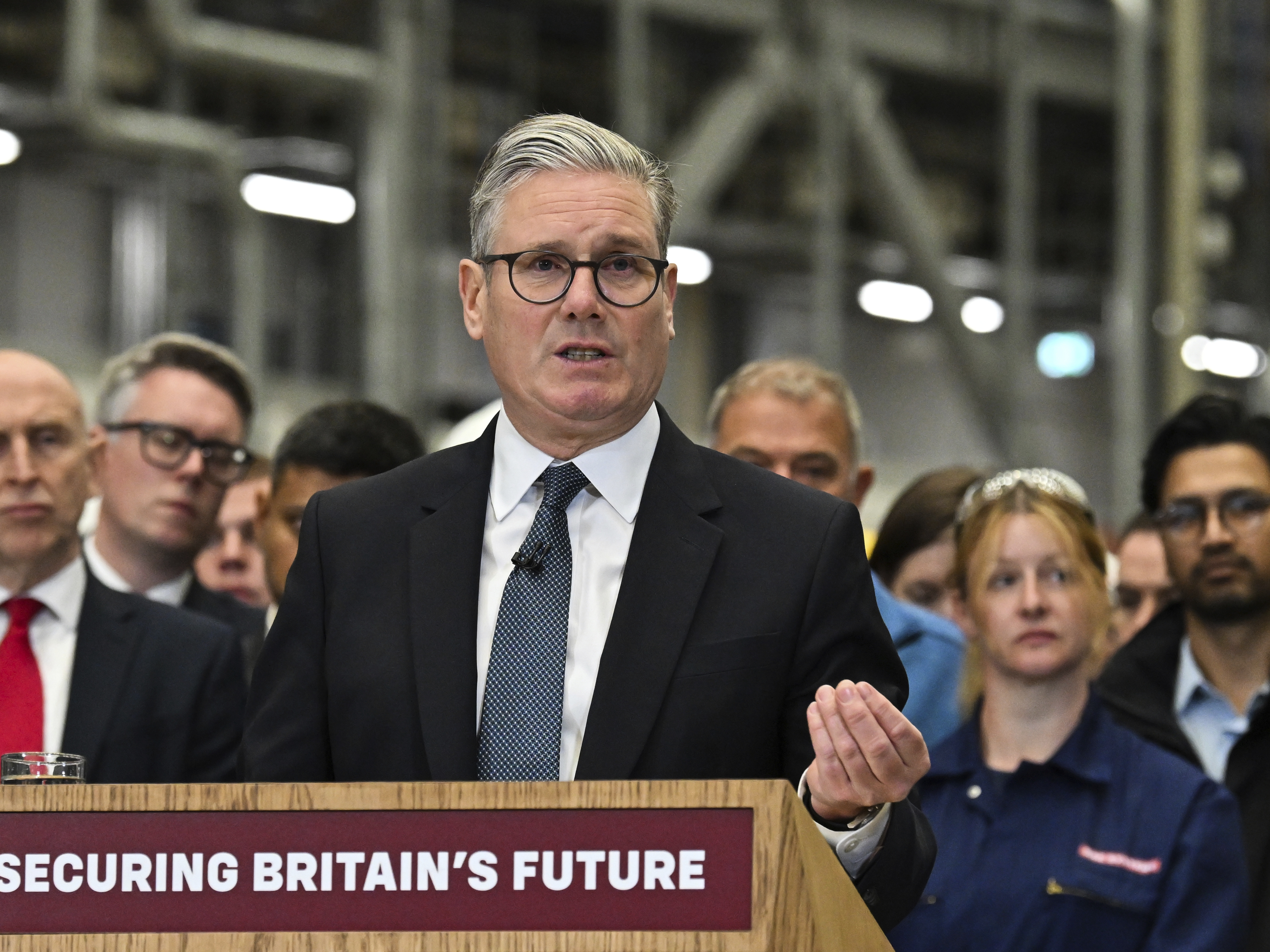 caption: Britain's Prime Minister Keir Starmer delivers his speech during a visit to the BAE Systems'Govan facility, in Glasgow, Scotland on Monday.