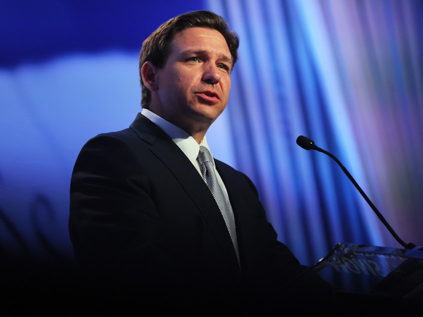 caption: Republican presidential candidate and Florida Gov. Ron DeSantis speaks during a Moms for Liberty summit in Philadelphia on Friday.