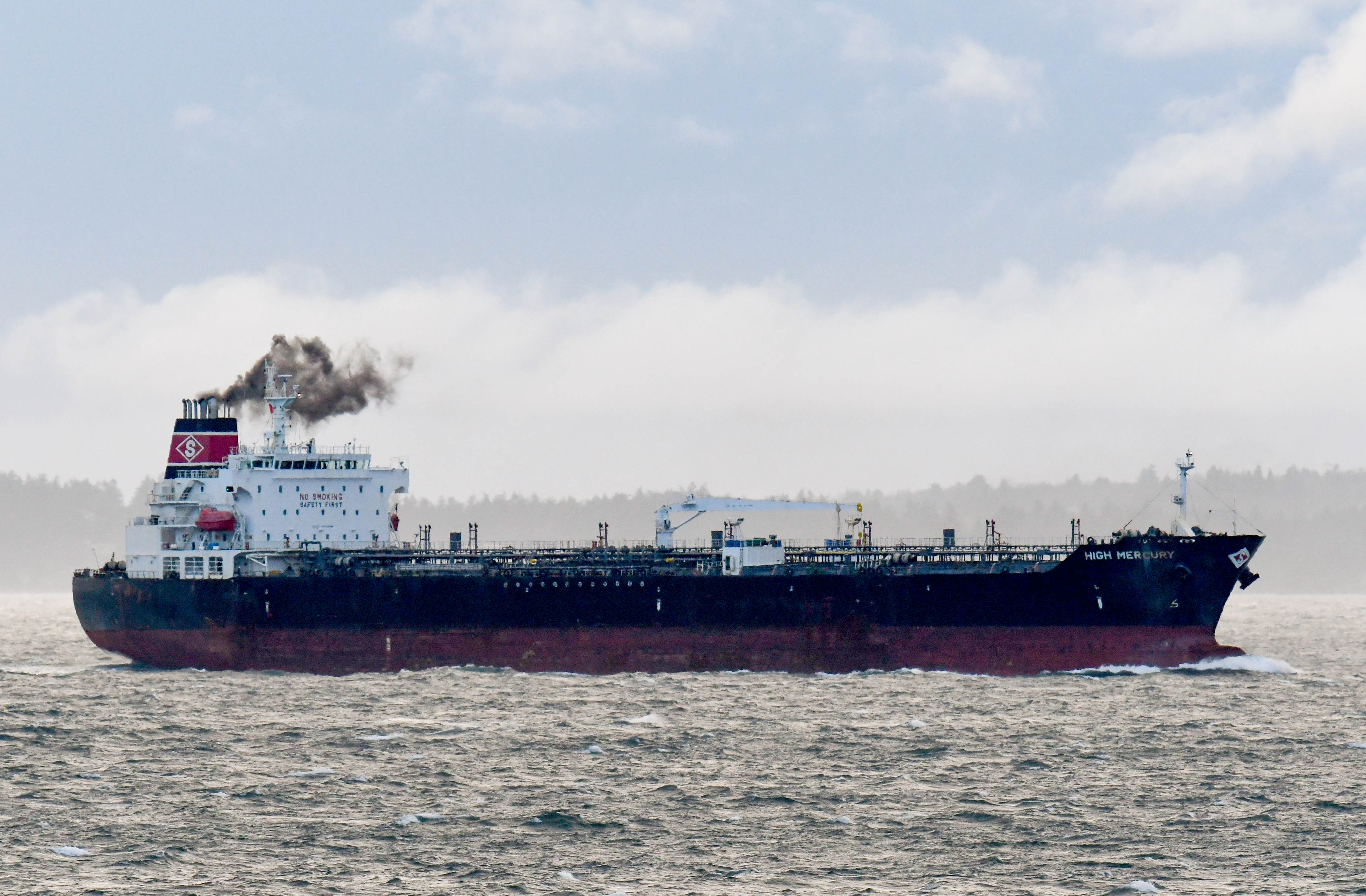 caption: The High Mercury tanker, part of a fleet co-owned by Commerce Secretary nominee Wilbur Ross, in Haro Strait with Vancouver Island in the background Feb. 15.