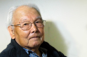 caption: Shiyogi Kawabata, 88, worked on a wooden chain (below) while interned at Minidoka, a Japanese internment camp in Idaho.