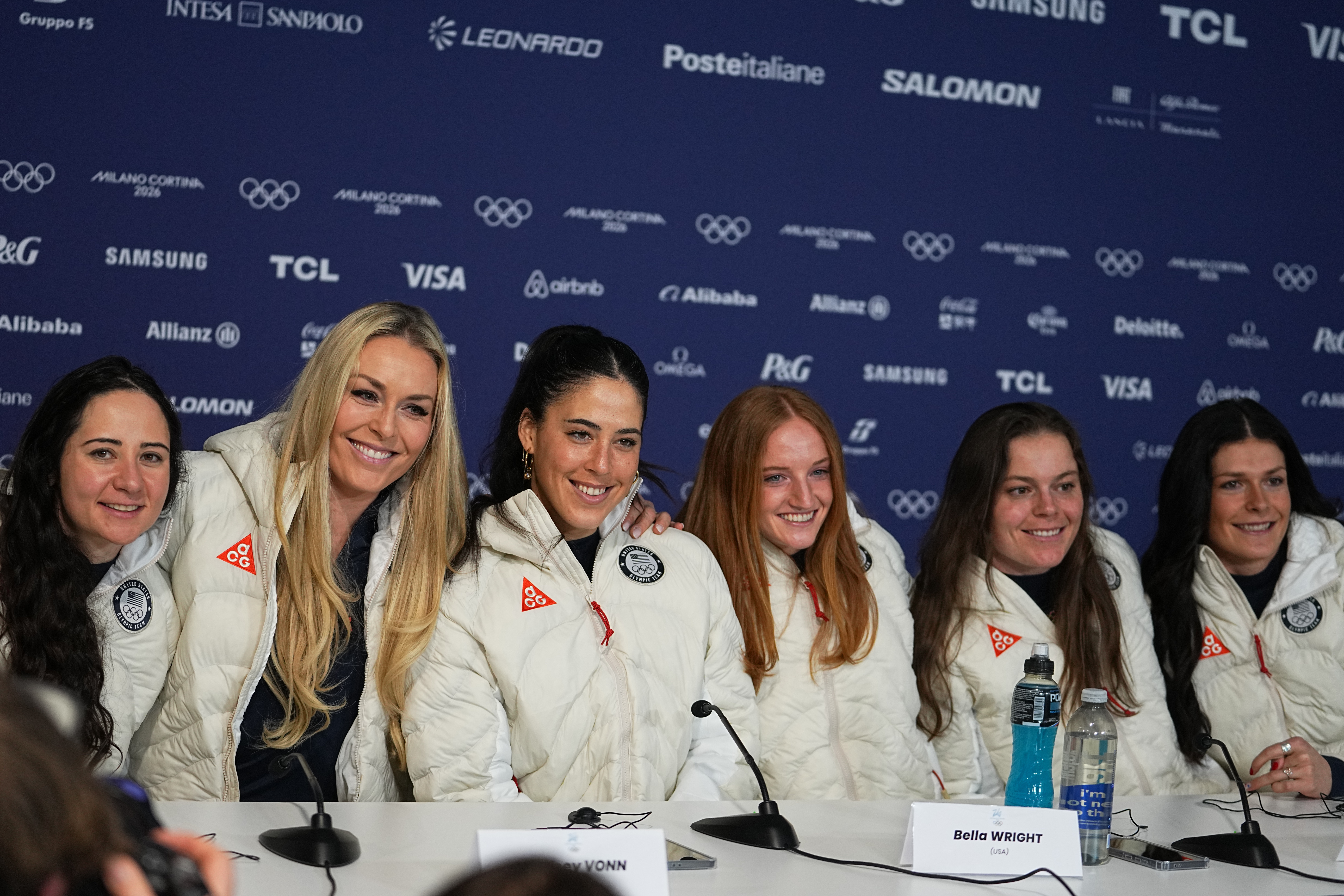 caption: United States' Jackie Wiles, Lindsey Vonn, Isabella Wright, Mary Bocock and Breezy Johnson, from left, attend a press conference by the U.S. ski team at the 2026 Winter Olympics, in Cortina d'Ampezzo, Italy, Tuesday, Feb. 3, 2026. 