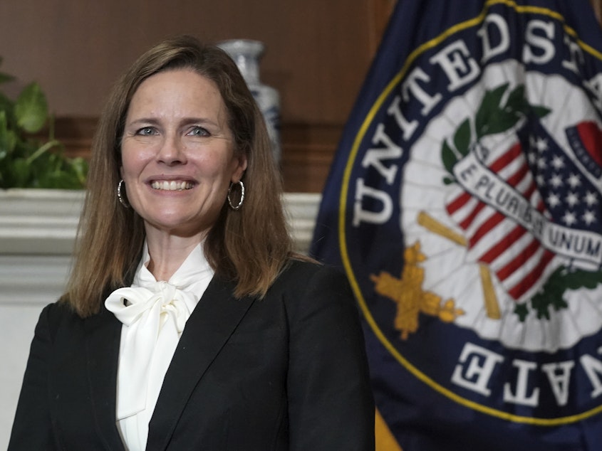 caption: Judge Amy Coney Barrett tested negative for the coronavirus.
