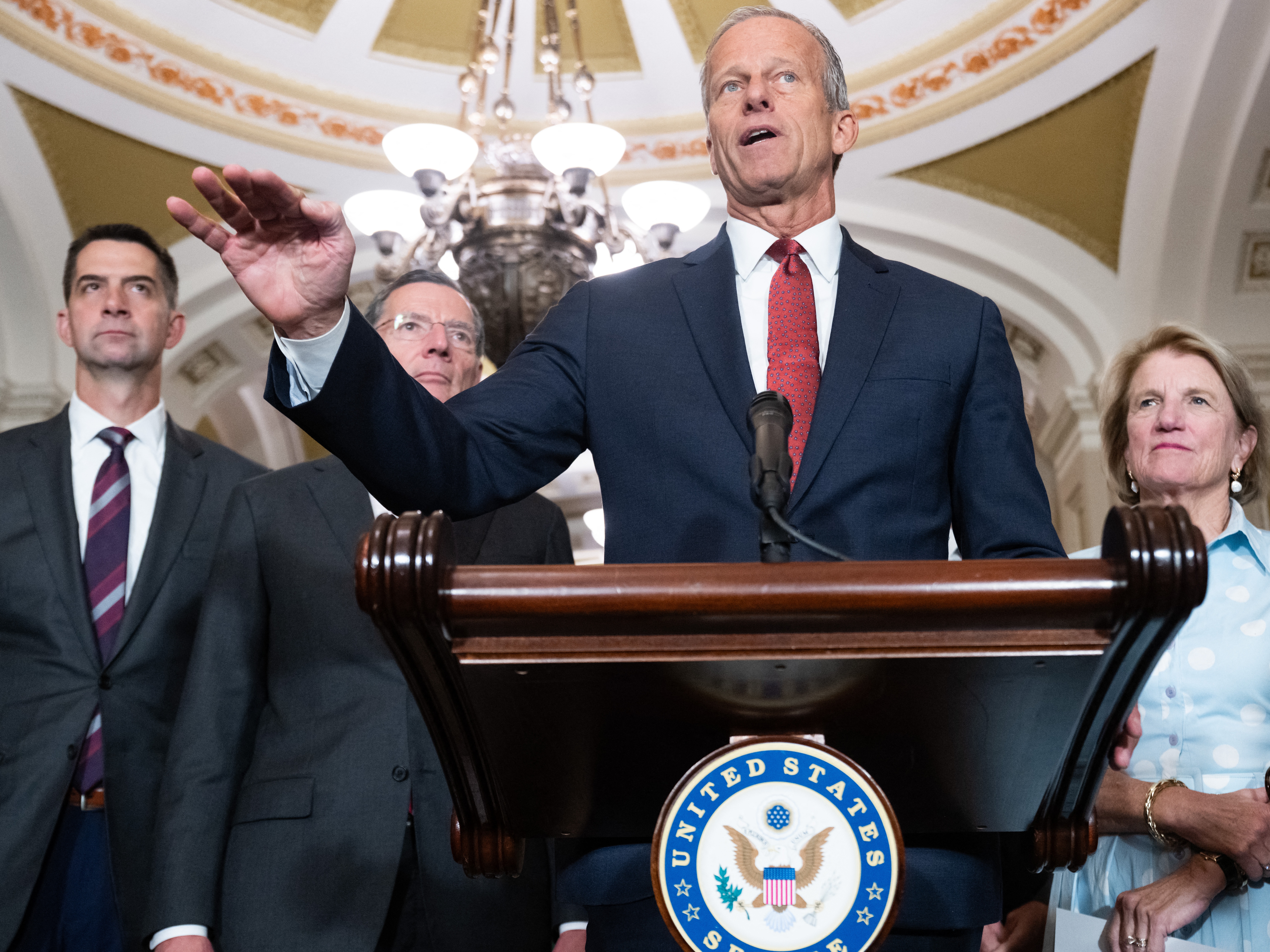 caption: Senate Majority Leader John Thune, R-S.D., speaks with reporters following the weekly Senate Republican luncheon at the Capitol in Washington, DC, on June 24. Senate Republicans are working to quickly pass the 'One Big, Beautiful Bill," President Trump's signature legislation.