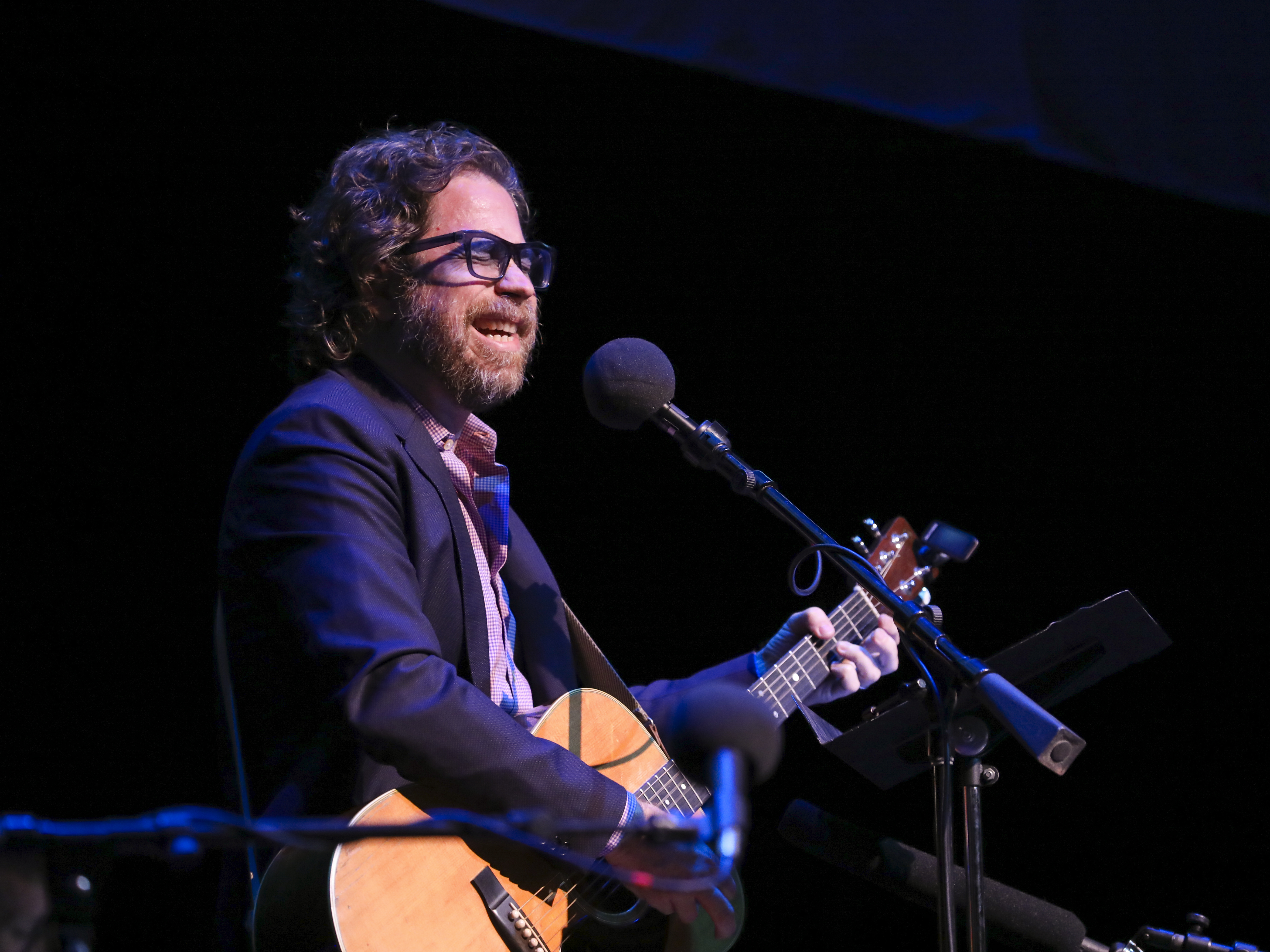 caption: <em>Ask Me Another</em>'s house musician Jonathan Coulton leads a music parody game at the Lobero Theatre in Santa Barbara, California.