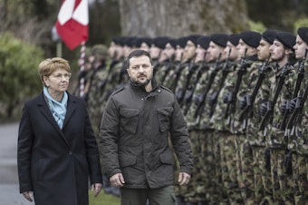 caption: Swiss Federal President Viola Amherd, left, and her guest, Volodymyr Zelenskyy, right, President of Ukraine, inspect the guard of honour in Kehrsatz near Bern, Switzerland, Monday, Jan. 15, 2024.