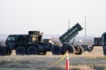 caption: A Patriot missile launcher seen in Poland in March.
