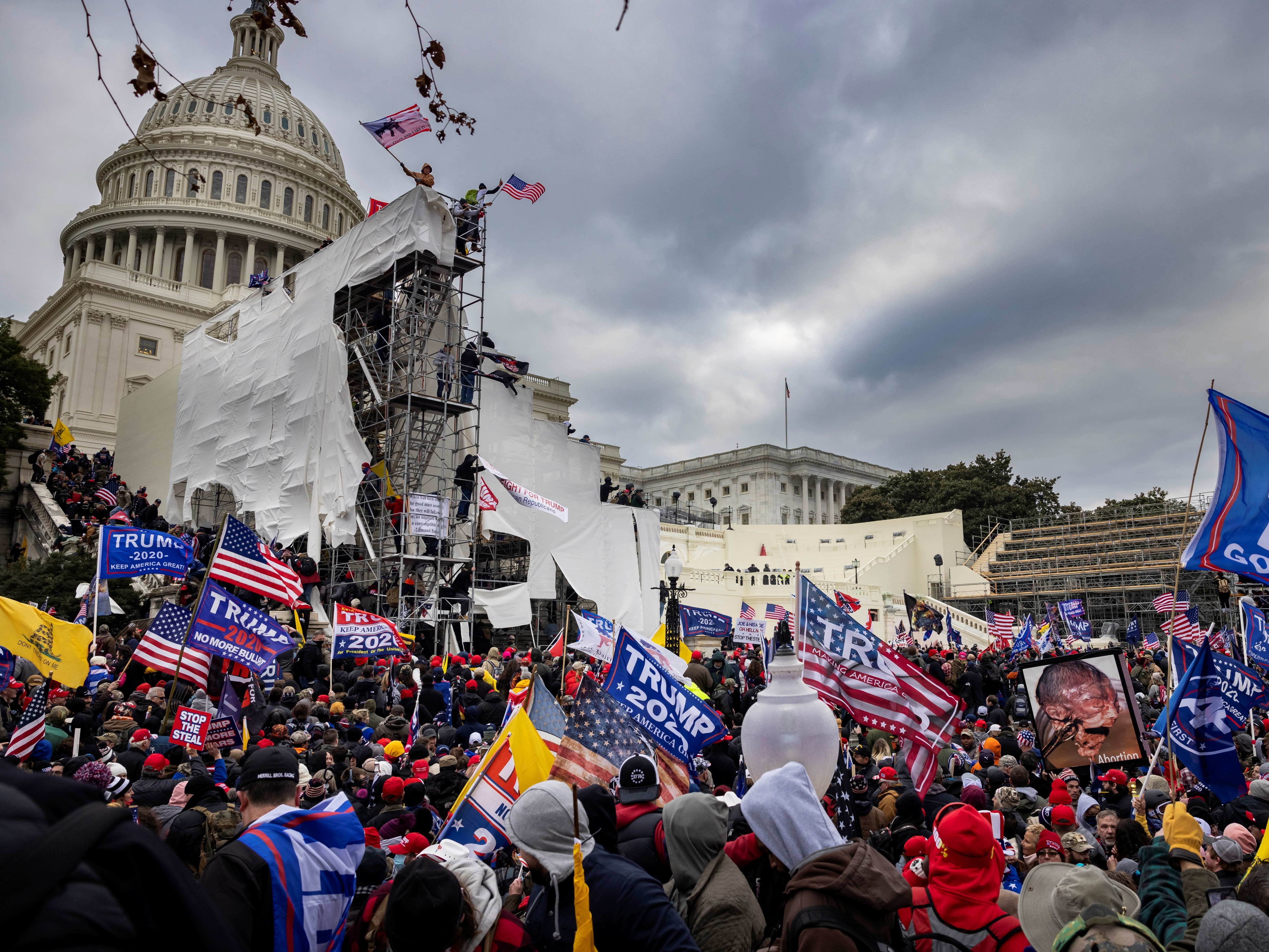 caption: Pro-Trump supporters breeched security and entered the U.S. Capitol on Jan. 6 as Congress debated the 2020 presidential election electoral vote certification. Even after the riot, election subversion is not an animating issue for most voters.