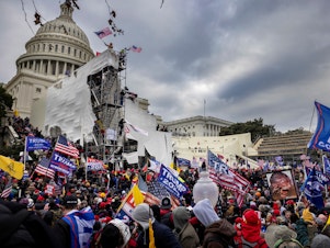 caption: Pro-Trump supporters breeched security and entered the U.S. Capitol on Jan. 6 as Congress debated the 2020 presidential election electoral vote certification. Even after the riot, election subversion is not an animating issue for most voters.