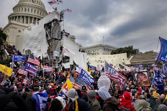 caption: Pro-Trump supporters breeched security and entered the U.S. Capitol on Jan. 6 as Congress debated the 2020 presidential election electoral vote certification. Even after the riot, election subversion is not an animating issue for most voters.