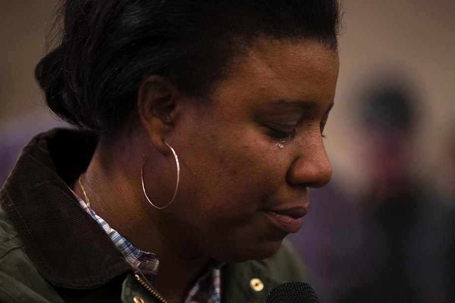 caption: Seattle City Council candidate Joy Hollingsworth becomes emotional while talking to supporters, family, and friends after initial results showed her in the lead during an election night party at the First AME Church on Tuesday, Nov. 7, 2023, in Seattle.