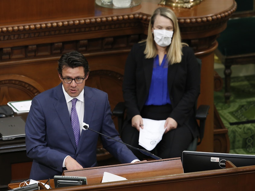 caption: Legislative Analyst Gabriel Petek, left, discusses Gov. Gavin Newsom's proposed 2020-21 revised state budget during a hearing the state Capitol in Sacramento, Calif., May 26, 2020. On Thursday, Dec. 7, 2023, Petek said California is facing a $68 billion budget deficit.