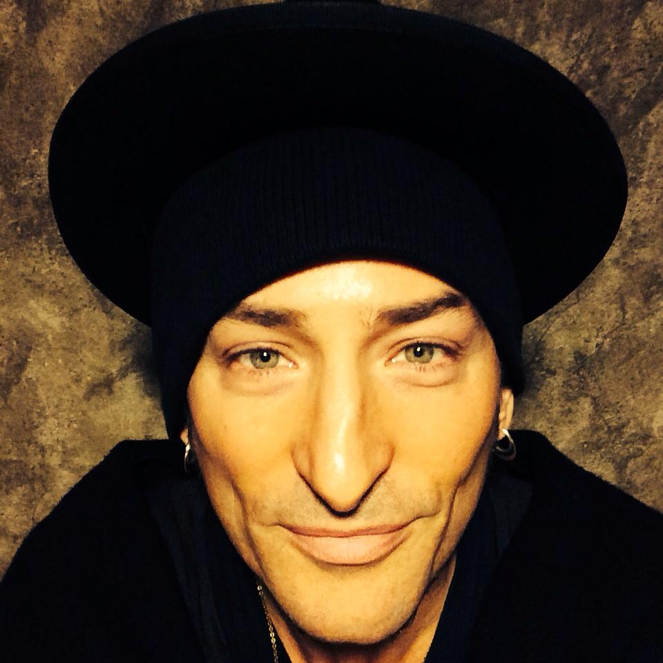 caption: Singer-songwriter Rafe Pearlman brings a new audience to ancient spiritual traditions.