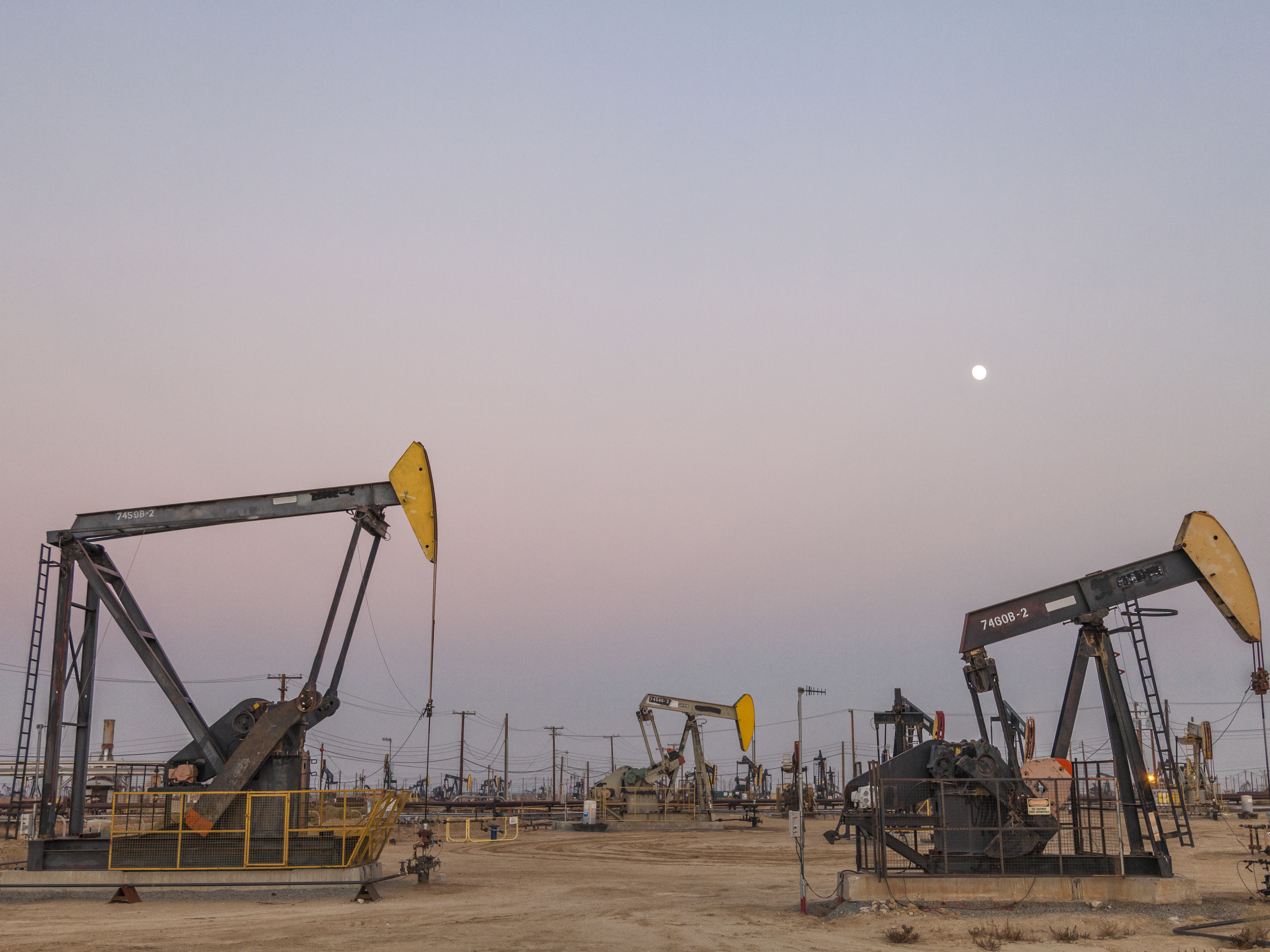 caption: A fracking site in Kern County, Calif. Fracking — short for hydraulic fracturing — is the process of extracting oil deep underground using a high-pressure water mixture to break up rock.