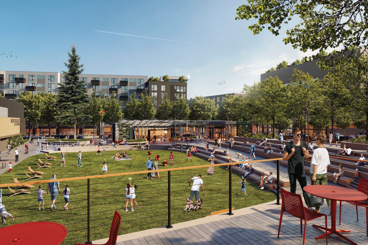 caption: This artist's rendering shows the park-like space planned for the center of Northgate's new community next to a light rail station.