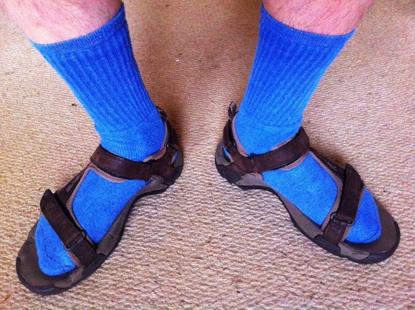 caption: Socks and sandals, a true Northwest fashion symbol