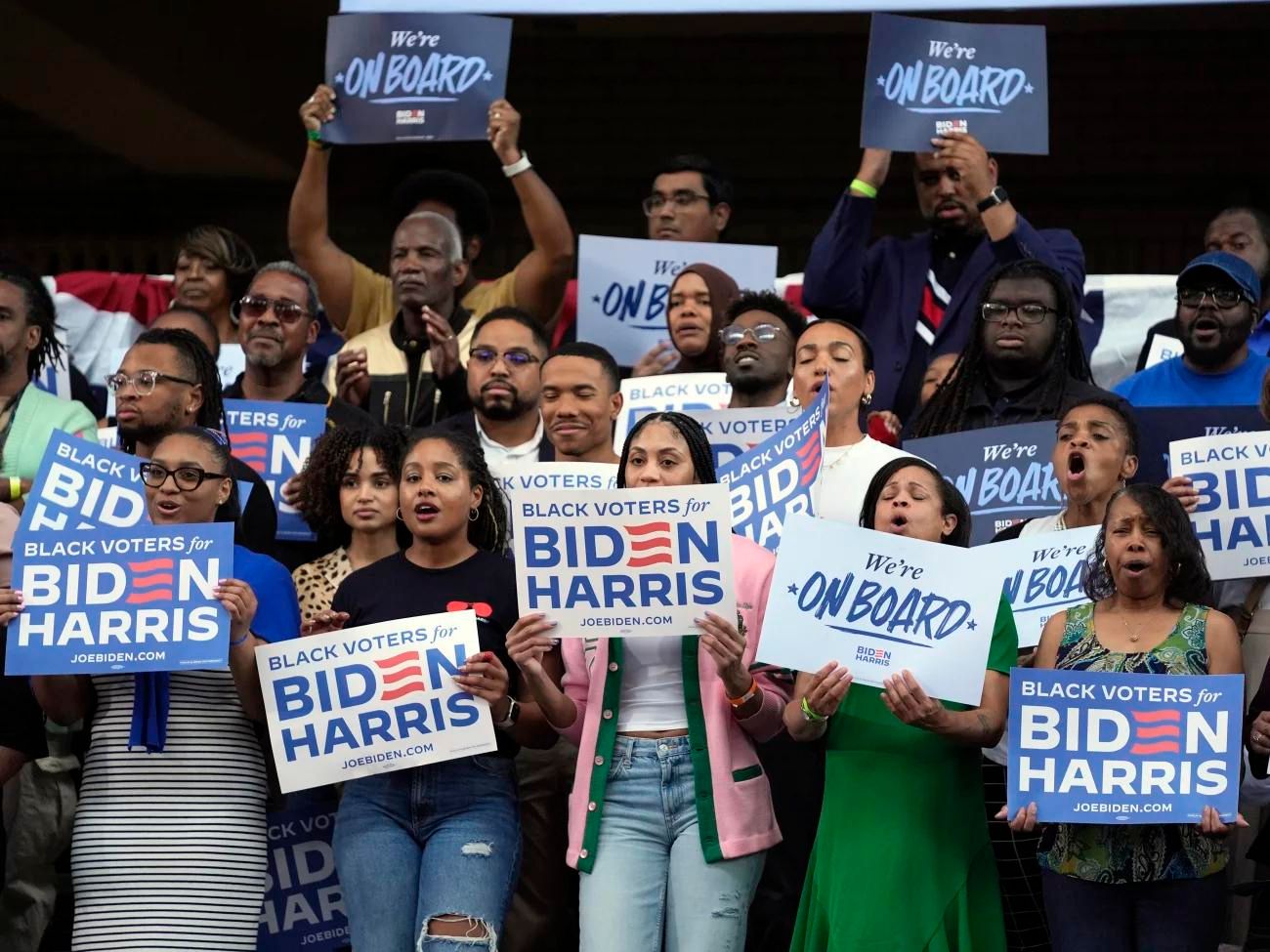 caption: Supporters listen as President Biden speaks during a Black Voters for Biden campaign event at Girard College, Wednesday, May 29, in Philadelphia. Biden won Black voters under 45 with around 80% in 2020. In a recent University of Chicago poll, that support is more of a question in 2024.
