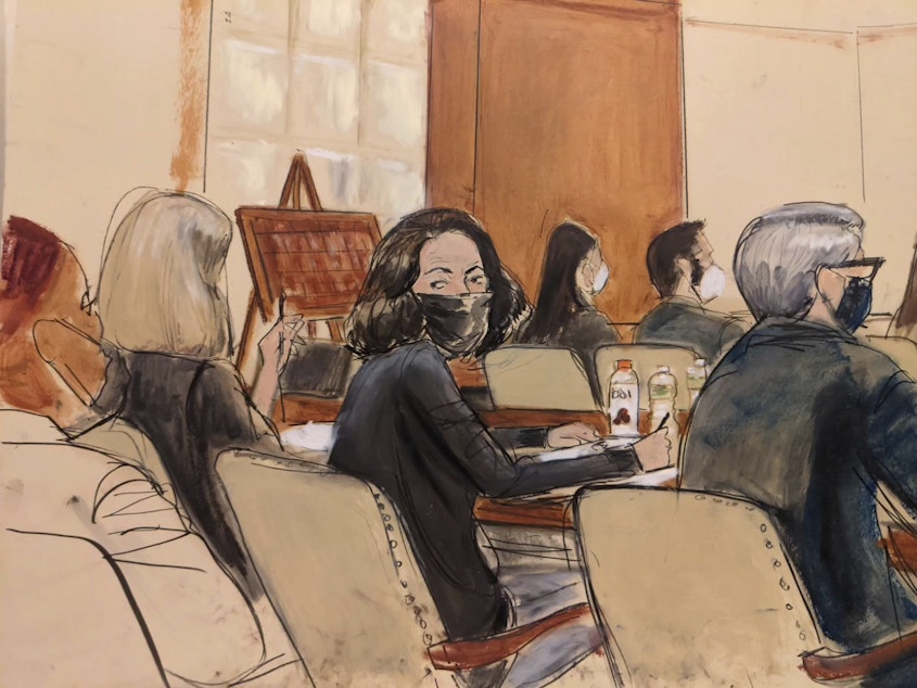 caption: In this courtroom sketch, Ghislaine Maxwell looks over her shoulder to the courtroom audience prior to the start of jury selection in her trial, Nov. 16, 2021, in New York.