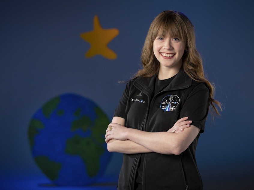 caption: A photo provided by St. Jude Children's Research Hospital shows Hayley Arceneaux at the hospital in Memphis, Tenn. It announced on Monday that Arceneaux, a former patient and current employee, will be one of four crew members on the first all-civilian space flight this year.