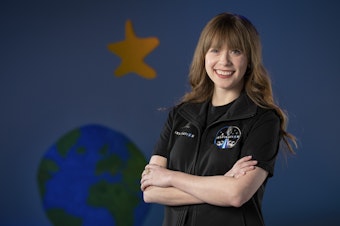 caption: A photo provided by St. Jude Children's Research Hospital shows Hayley Arceneaux at the hospital in Memphis, Tenn. It announced on Monday that Arceneaux, a former patient and current employee, will be one of four crew members on the first all-civilian space flight this year.