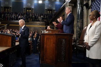 caption: President Biden prepares to deliver the State of the Union address to a joint session of Congress at the Capitol on Feb. 7 as Vice President Kamala Harris, House Speaker Kevin McCarthy of Calif., and Clerk of the House of the Representatives Cheryl Johnson watch.