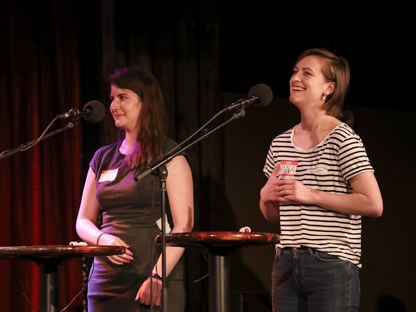 caption: Contestants Liz Jazwiecki and Anna Fenske appear on <em>Ask Me Another</em> at the Bell House in Brooklyn, New York.