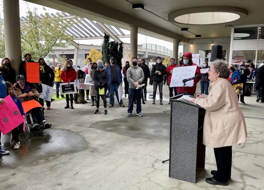 caption: Janis White, president of the Seattle Special Education PTSA, delivers a speech at a rally held outside of Seattle Public Schools' headquarters on Wednesday, October 28, 2021 in protest of the district's plan to change special education staffing at various schools. 
