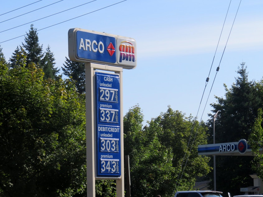 caption: A mass mailing of settlement checks meant it was Christmas in midsummer for drivers who filled their tanks at Oregon ARCO stations in 2011-13.