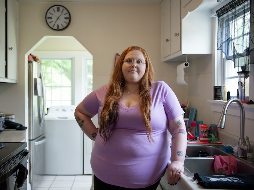 caption: Bethany Birch paid more than $5,200 toward her medical debt after getting sued by Ballad Health in 2018. Owing to a Tennessee court judgment, she accrued an additional $2,700 in interest over that time.