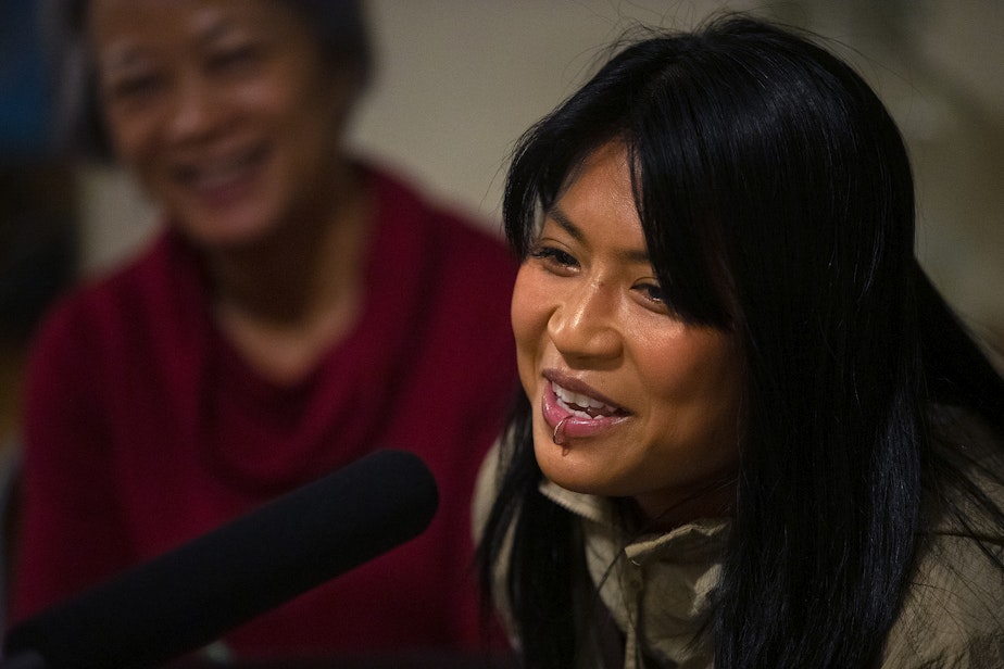 caption: Daneca Tran shares a story during a dinner party on Thursday, October 6, 2022, in South Park. 
