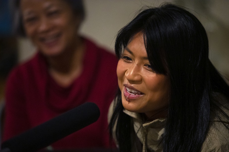 caption: Daneca Tran shares a story during a dinner party on Thursday, October 6, 2022, in South Park.