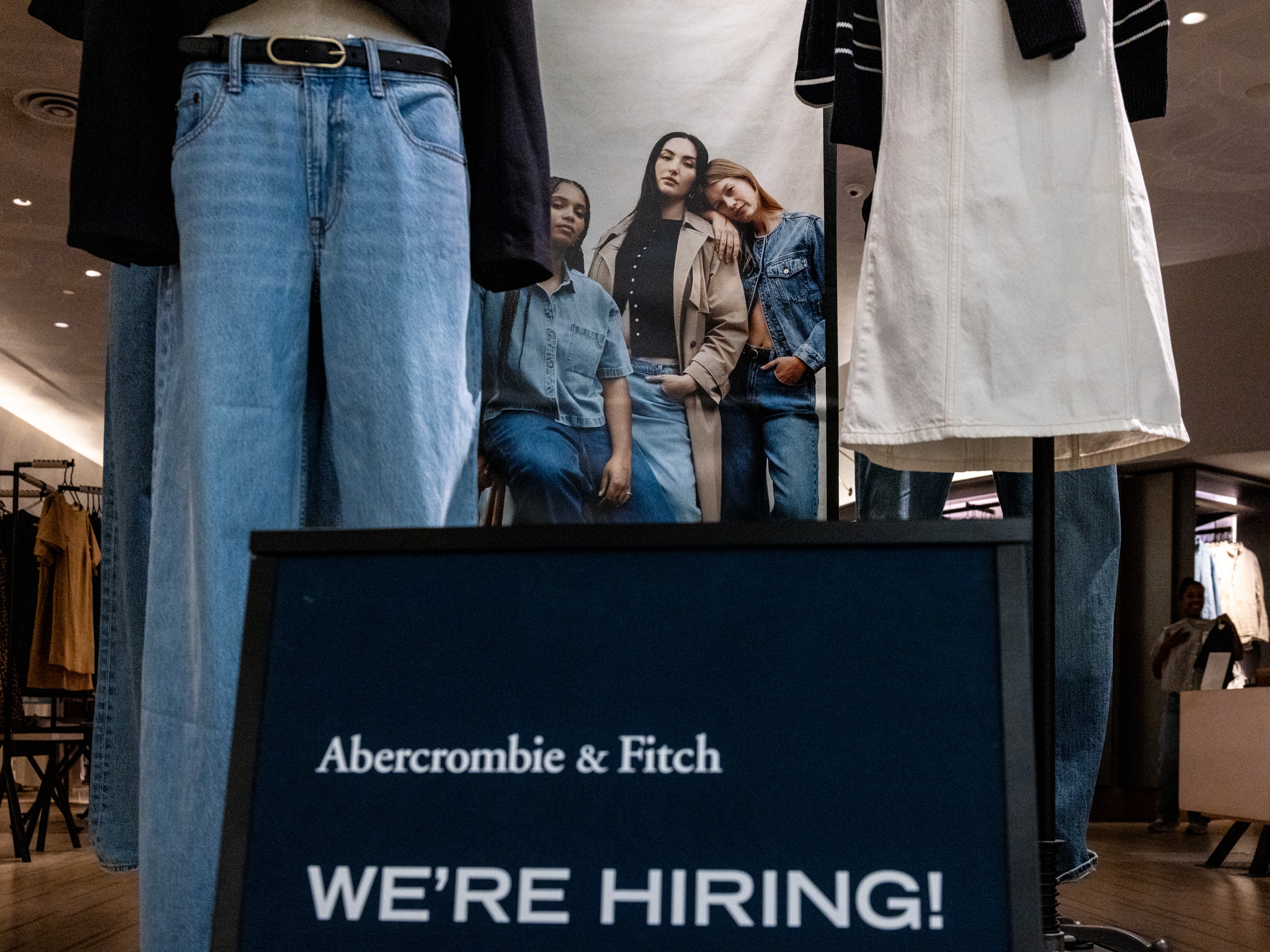 caption: U.S. employers added 256,000 jobs last month, while the unemployment rate edged down to 4.1%.  Cyclical industries such as restaurants and retail added tens of thousands of jobs in December.