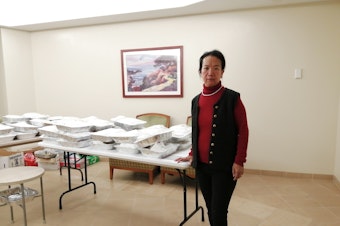 caption: Chunlin Leonhard, is under quarantine at the Travis Air Force Base. She and others under quarantine are housed on base and where they receive delivered meals three times a day.