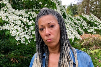 caption: Angel Graves, a student and family advocate in Seattle Public Schools, stands for a portrait on June 23, 2020.