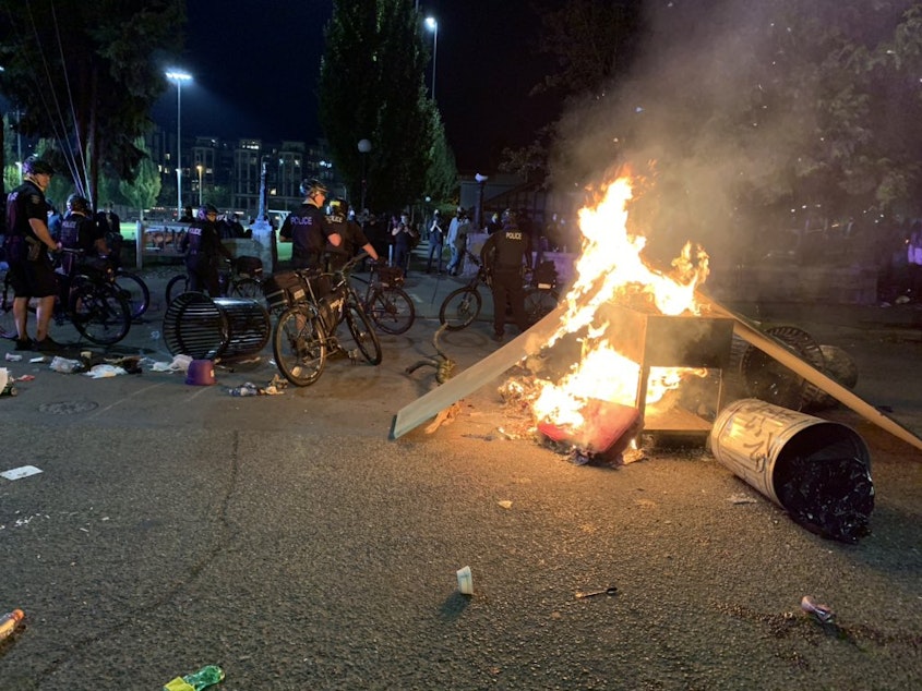 caption: A fire set in the street during a protest in Seattle's Capitol Hill neighborhood, Sept. 26, 2020. 