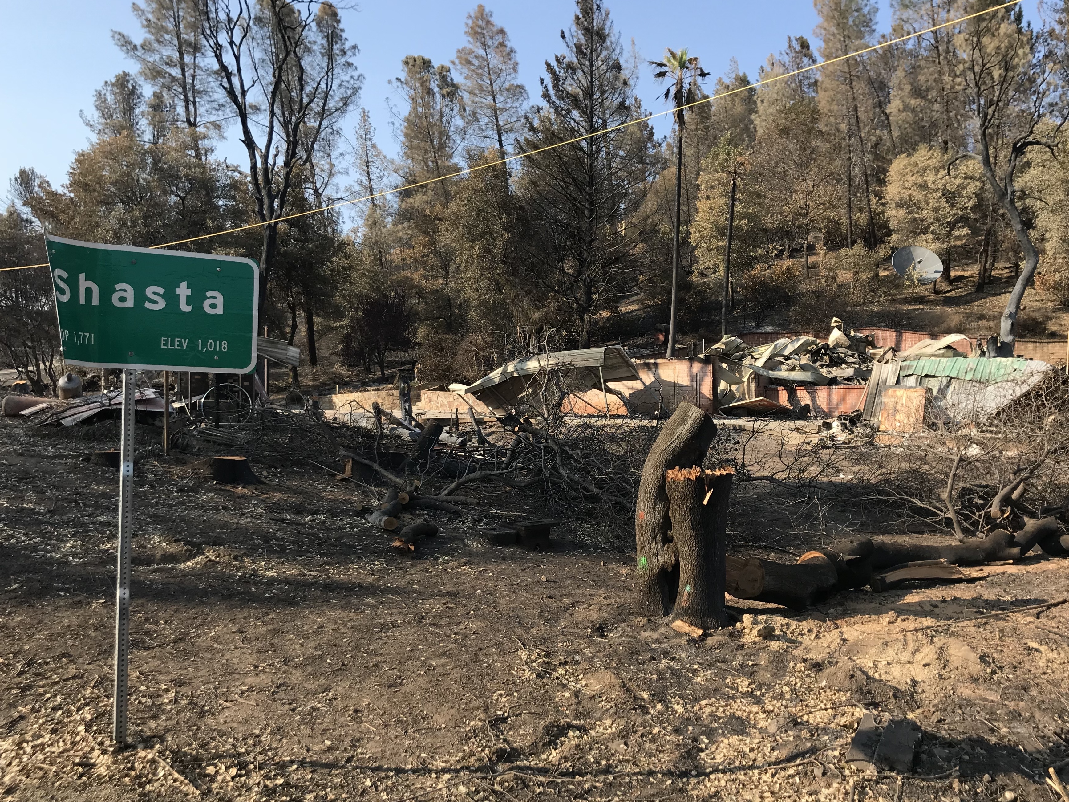 caption: This summer's Carr Fire destroyed more than a thousand homes, largely on the western edge of Redding, California.