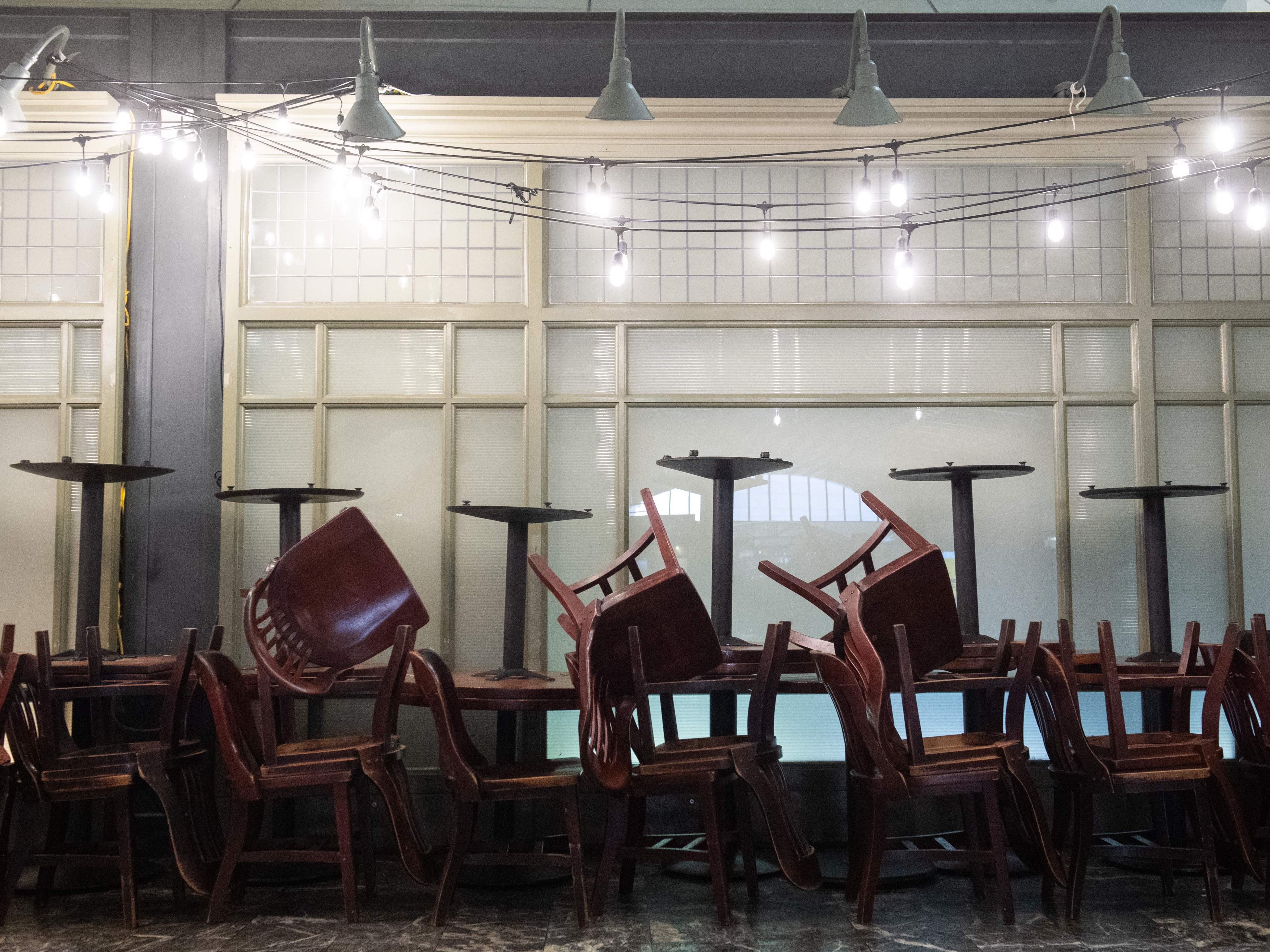 caption: A closed restaurant at Union Station in Washington, D.C. The Federal Reserve addressed several new lending programs in an effort to keep businesses and local governments afloat during the coronavirus pandemic.