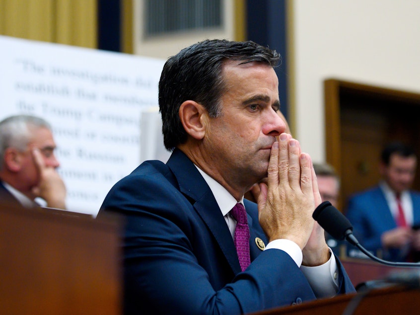 caption: Rep. John Ratcliffe, President Trump's nominee for the next director of national intelligence, listens as former special counsel Robert Mueller testified on Capitol Hill last week.