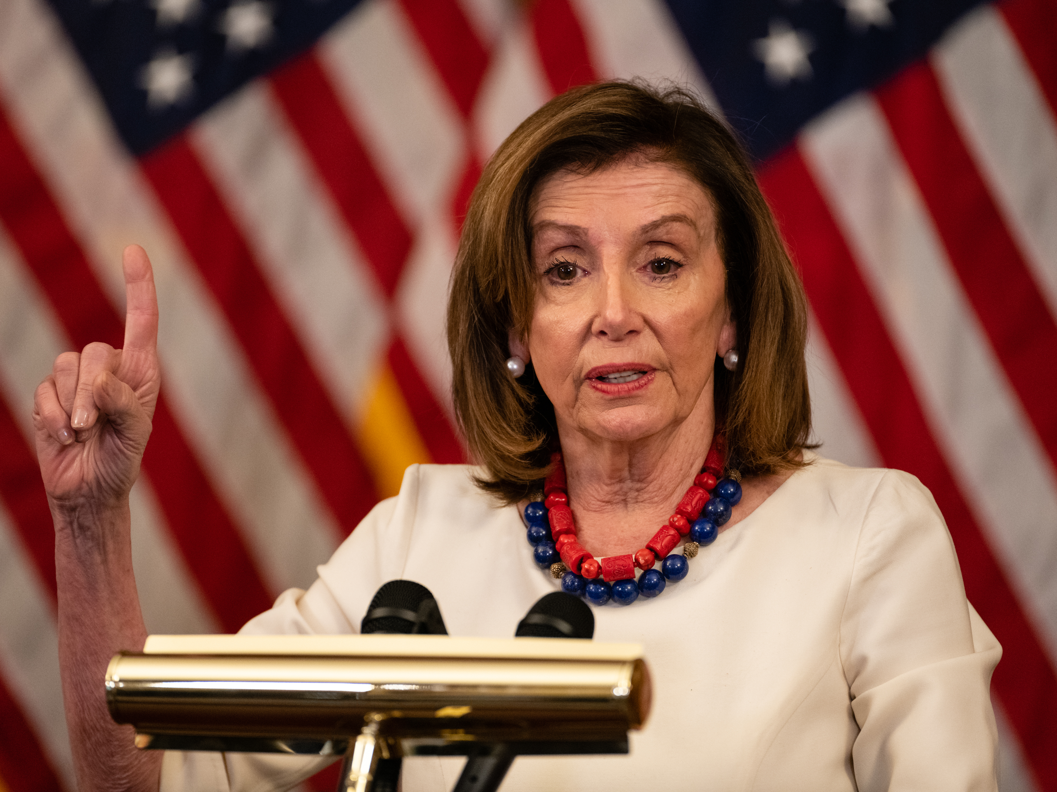 caption: House Speaker Nancy Pelosi, D-Calif., told reporters she doesn't think new laws governing lawmakers' investments are needed, but if members want one she would go along with it.