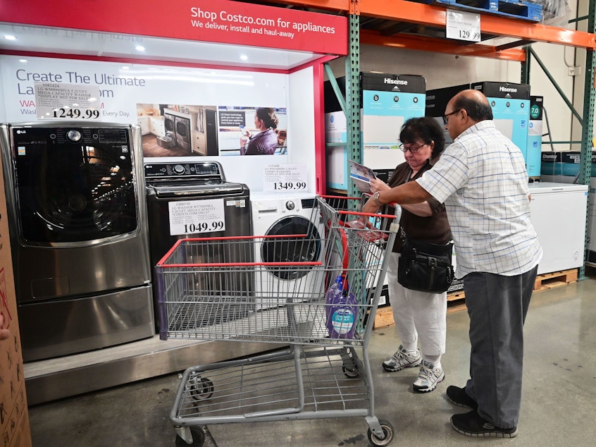 caption: Median household income rose sharply last year, while poverty declined to 10.5% — the lowest since records began in 1959, according to the Census Bureau.